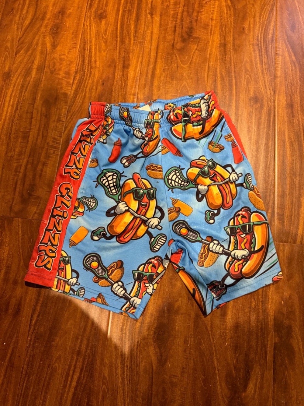 Rizzy Glizzys Cartoon Hot Dog Print Lacrosse Shorts - Blue & Orange Youth L
